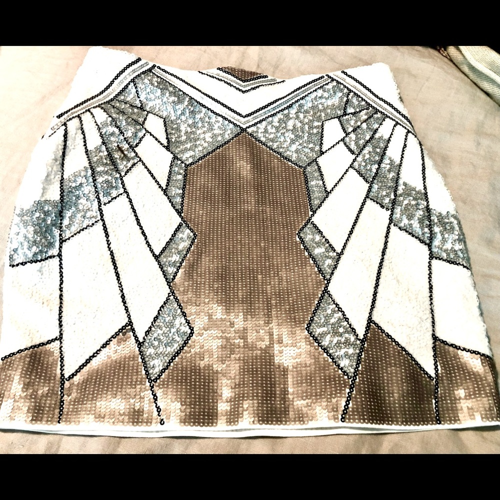 Express skirt, size small, silver, white and gold glitter all over. Gorgeous!